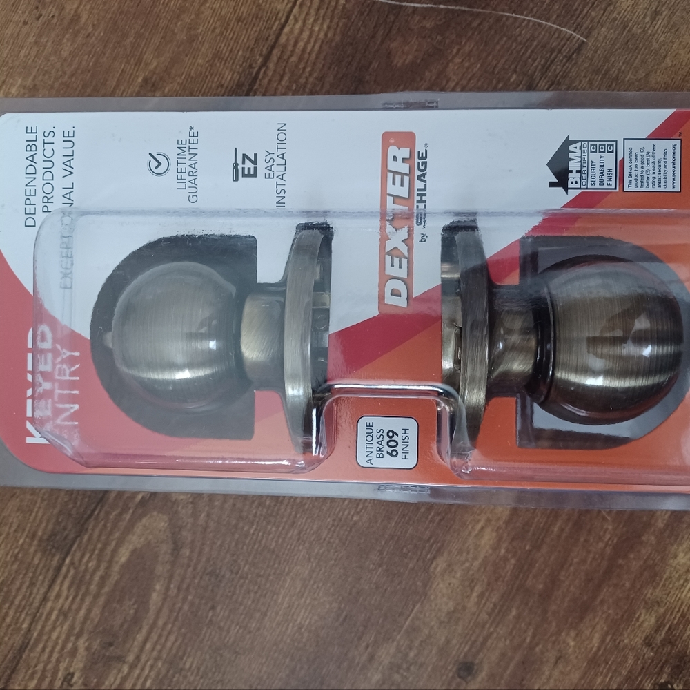 Dexter by Schlage Keyed entry antique brass finish 609